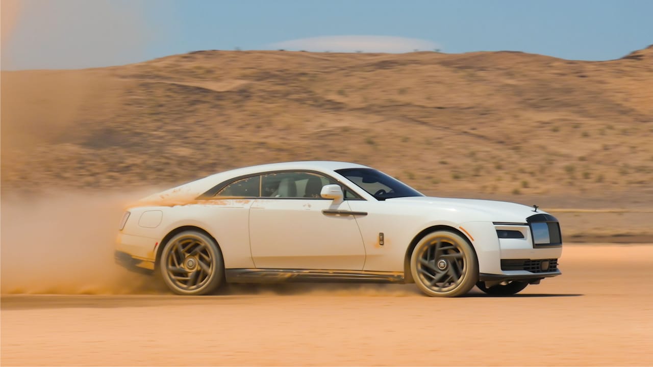 Filthy Rolls-Royce Spectre Black Badge Rolls-Royce Spectre Black Badge covered in dirt after a salt lake run.