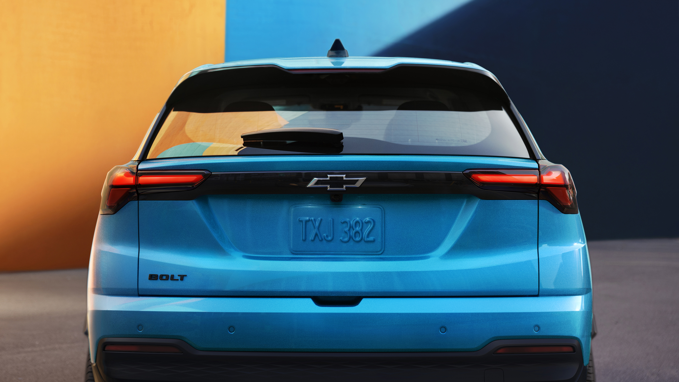 The 2026 Chevrolet Bolt charging at a public charging station.