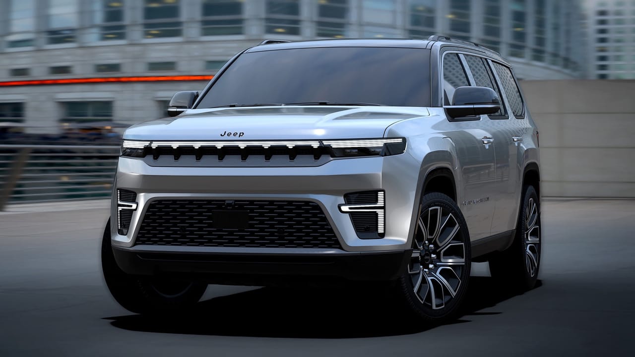 Front view of the 2026 Jeep Grand Wagoneer, showcasing its streamlined headlights and signature grille.