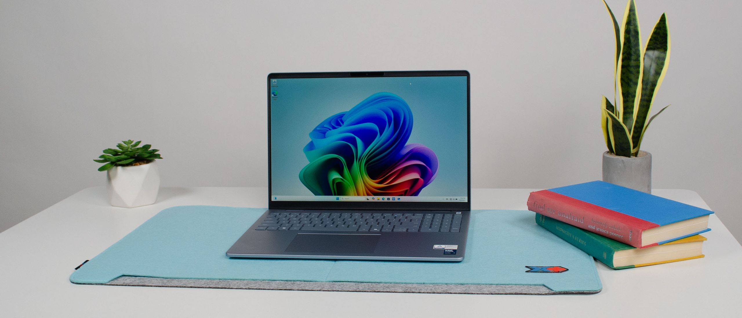 Close-up of the Dell Inspiron 16 Plus keyboard and trackpad