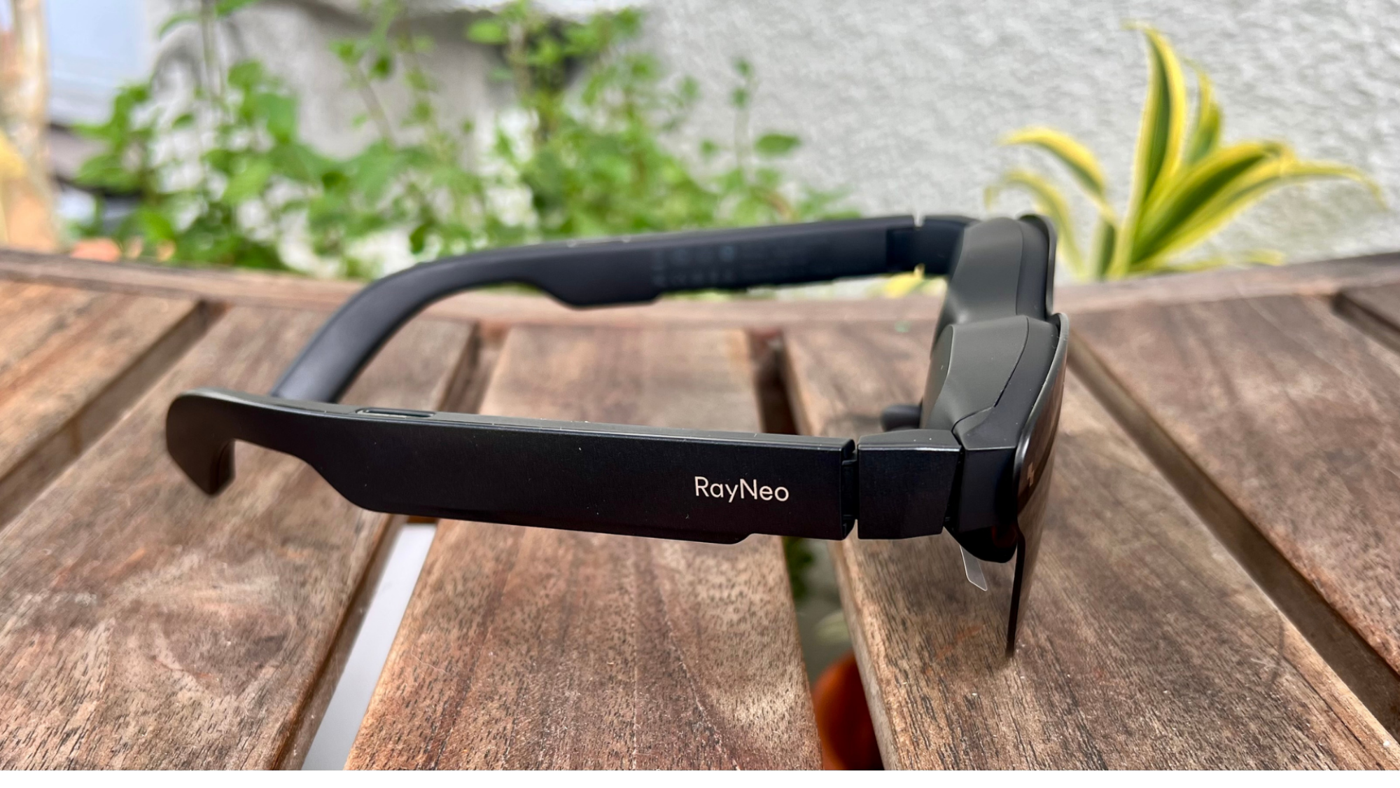 RayNeo Air 3s Pro paired with headphones