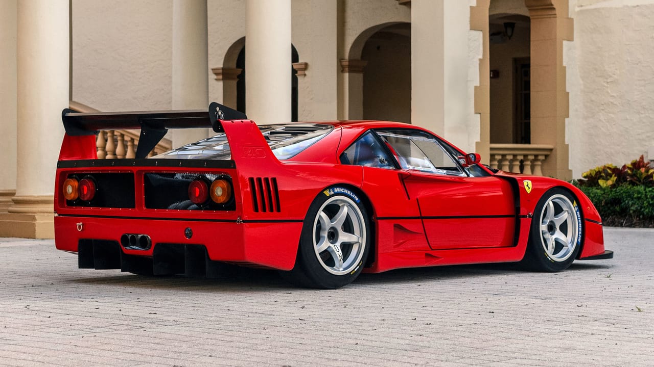 A collection of classic cars displayed at Monterey Car Week, showcasing the variety of vehicles auctioned.