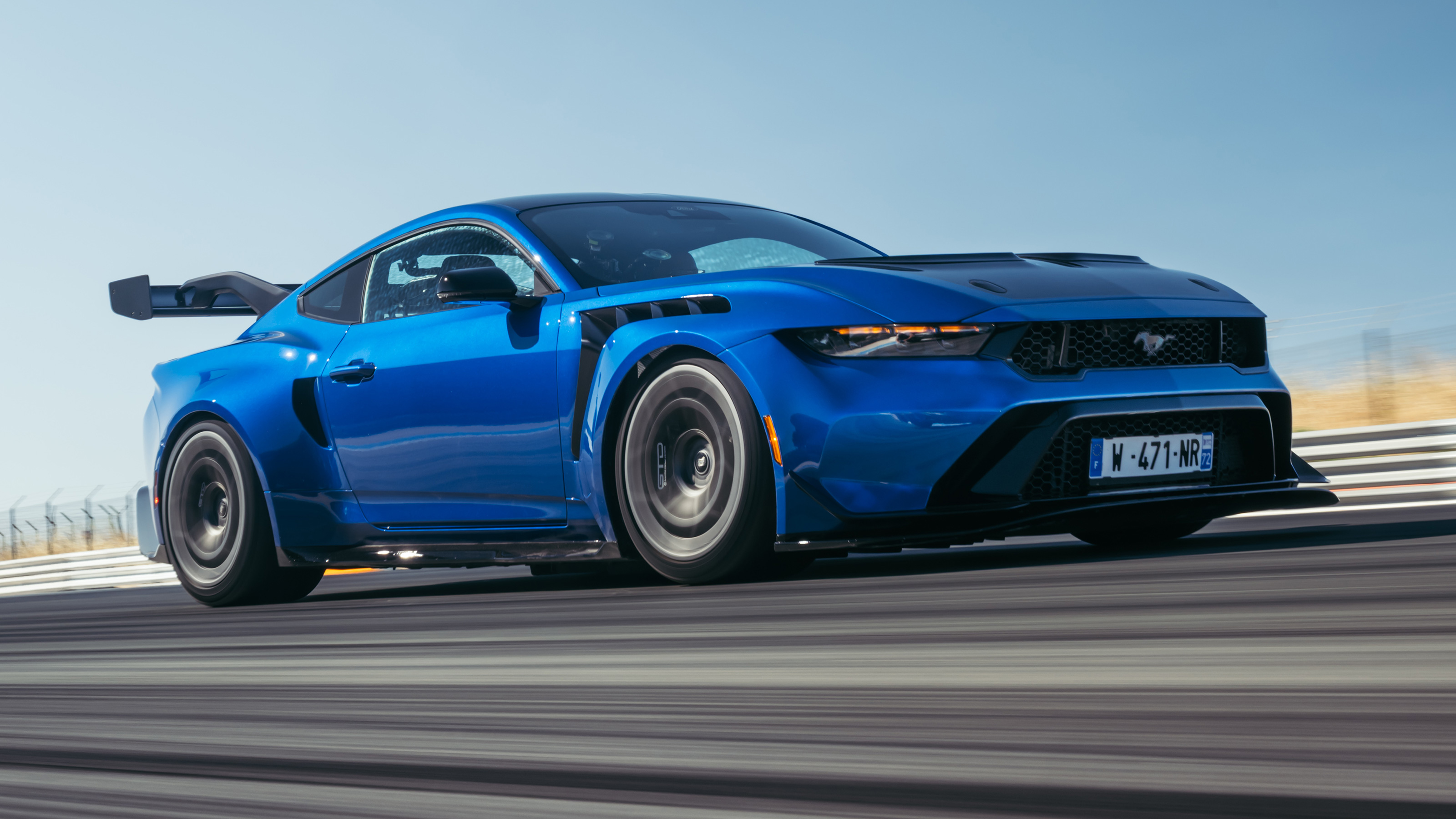 Ford Mustang GTD Rear Wing: Aerodynamic Excellence Close-up of the Ford Mustang GTD's rear wing, highlighting its aerodynamic design