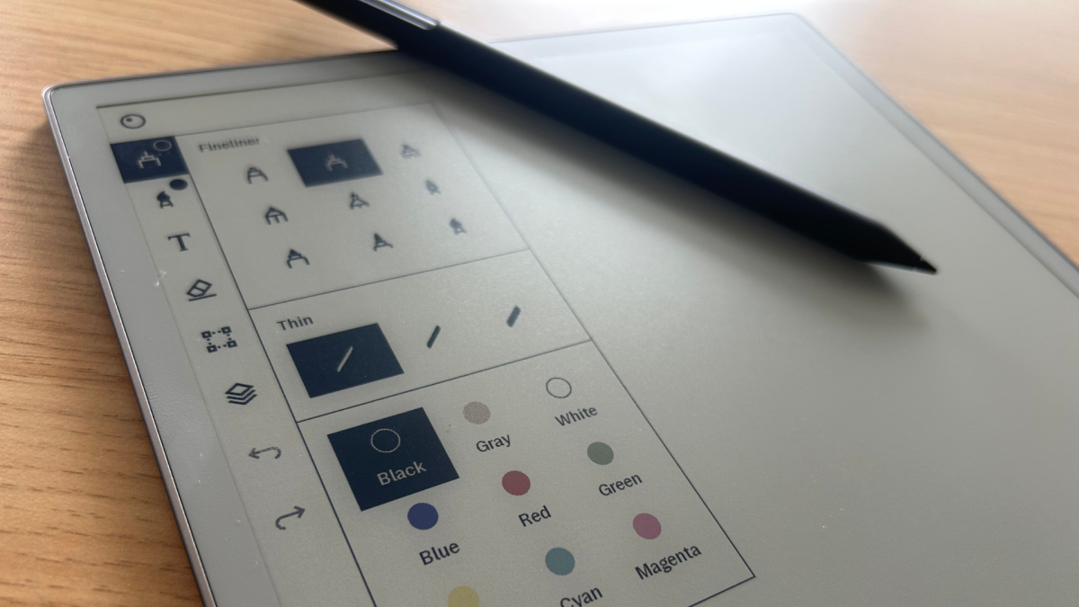 Close-up of a reMarkable 2 tablet displaying a handwritten note, illustrating its paper-like writing feel.