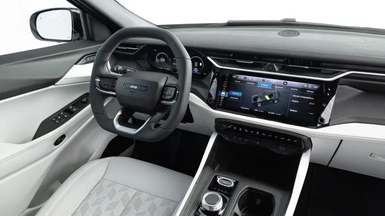 Exterior of the 2026 Jeep Cherokee Hybrid, showcasing its redesigned front fascia and modern styling