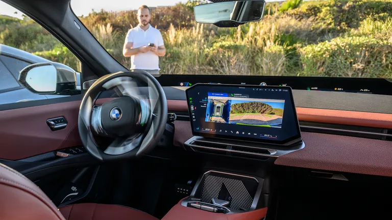 The 2027 BMW iX3 showcasing its innovative lighting technology.