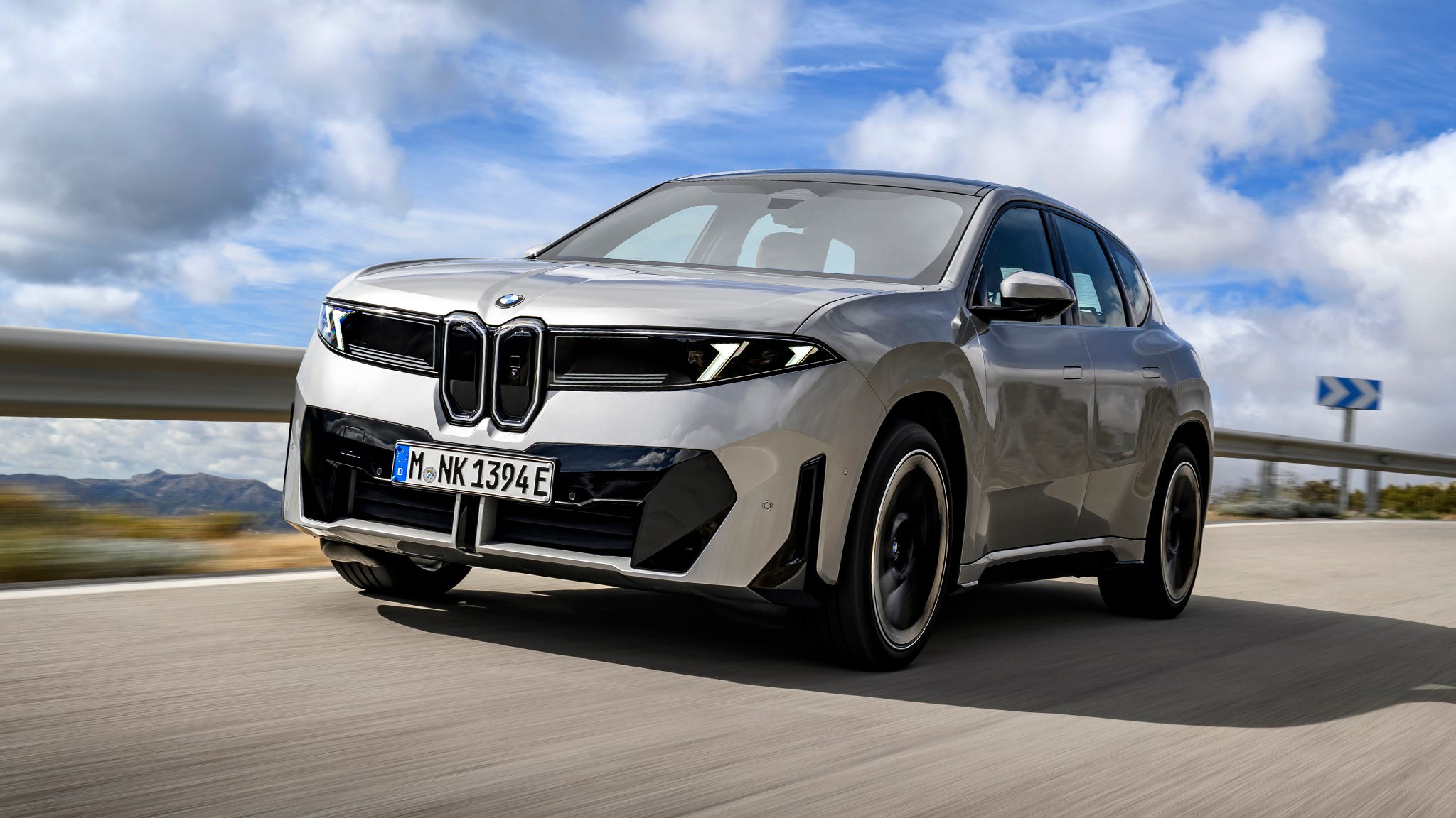 The sleek profile of the 2027 BMW iX3 showcasing its modern design.