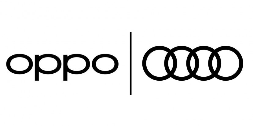 Audi and OPPO executives discussing 5G patent licensing for automotive connectivity