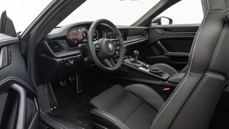 Dynamic shot of the 2025 Porsche 911 GT3 Touring in motion