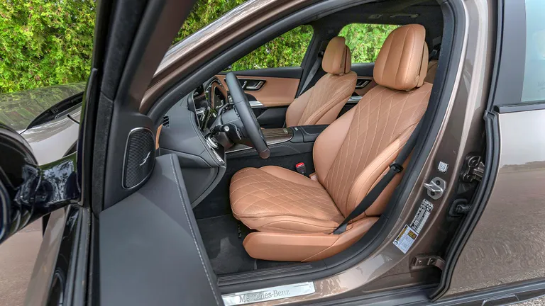 Spacious rear cargo area of the Mercedes-Benz E450 All-Terrain Wagon with seats folded down.