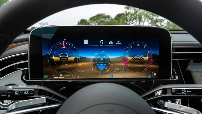 Mercedes-Benz E450 All-Terrain Wagon undergoing routine service at a dealership.