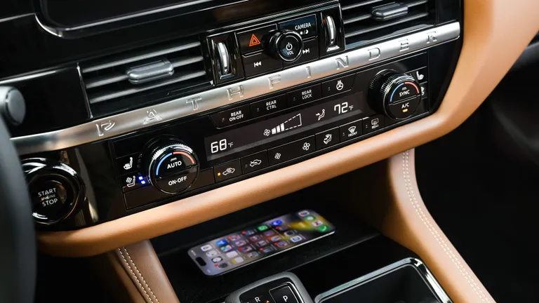 The innovative wireless, magnetic, fan-cooled phone charger in the 2026 Nissan Pathfinder's center console. This is a standout among the 2026 Nissan Pathfinder Innovations.