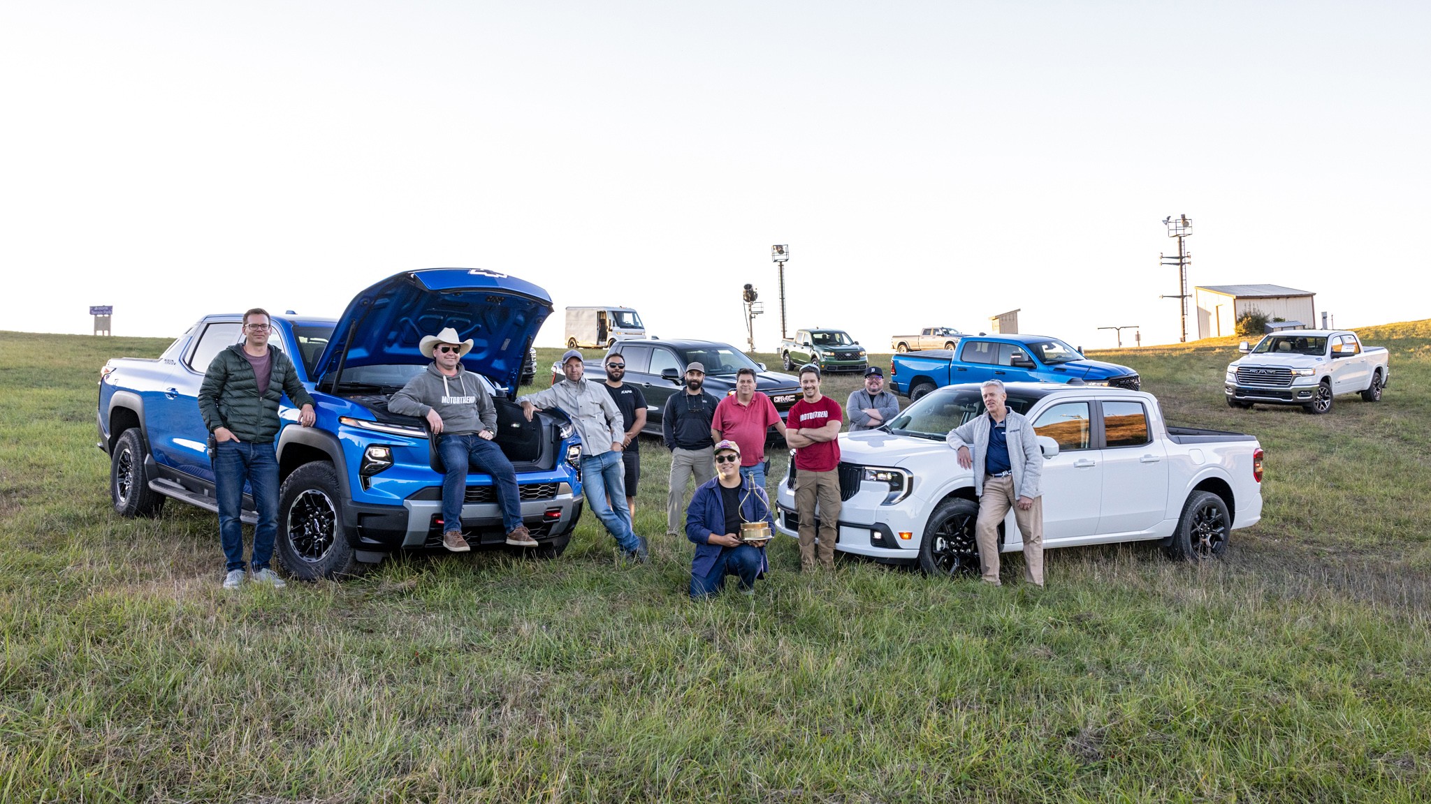A powerful forklift assisting a stuck pickup truck during the 2026 MotorTrend Truck of the Year testing