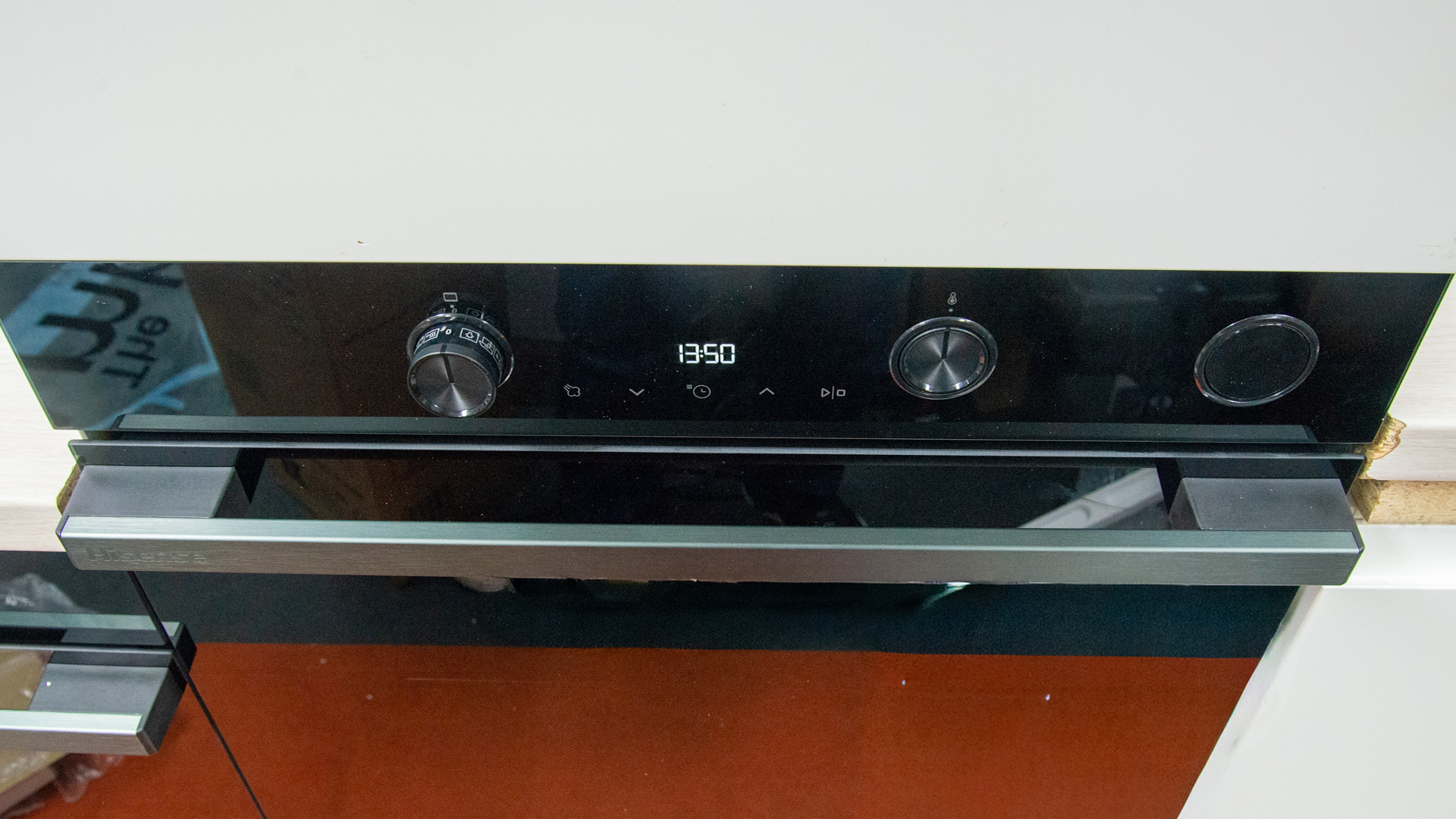 Sleek Hisense BSA66226ADBGUK oven integrated into a modern kitchen setting