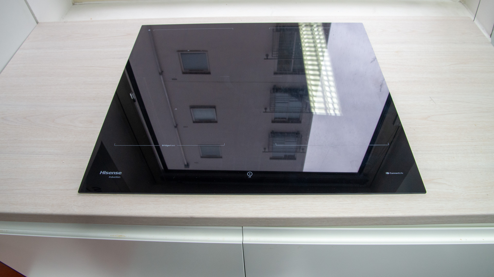 Hisense HI6443BSCWF Induction Hob in a modern kitchen setting