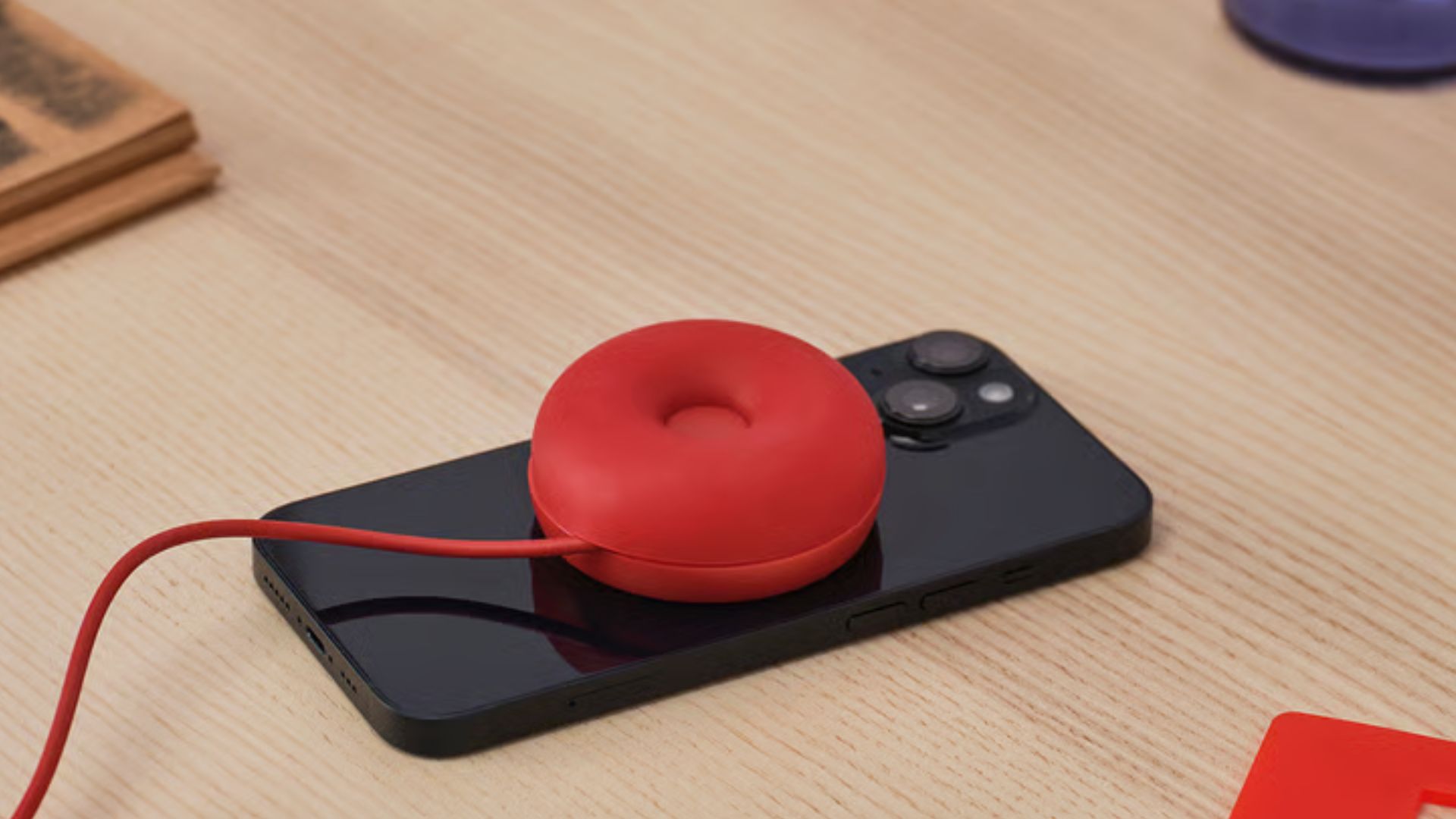 Ikea Qi2 wireless charger with a distinctive, multi-faceted design