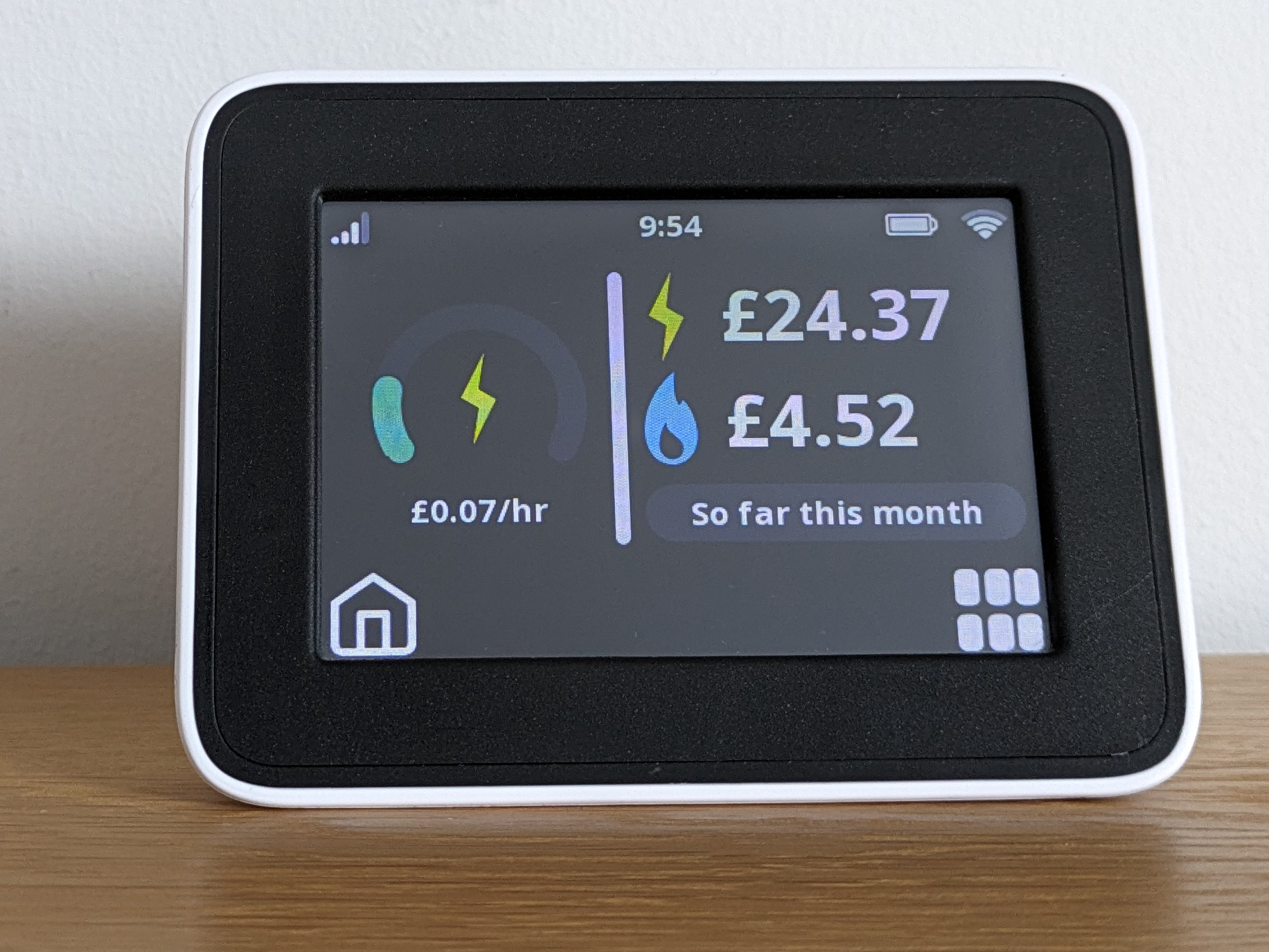 Smart Energy Management for Time-of-Use Electricity Tariffs A family actively managing their home's energy use to save money on Time-of-Use Electricity Tariffs, with smart devices and a schedule visible.