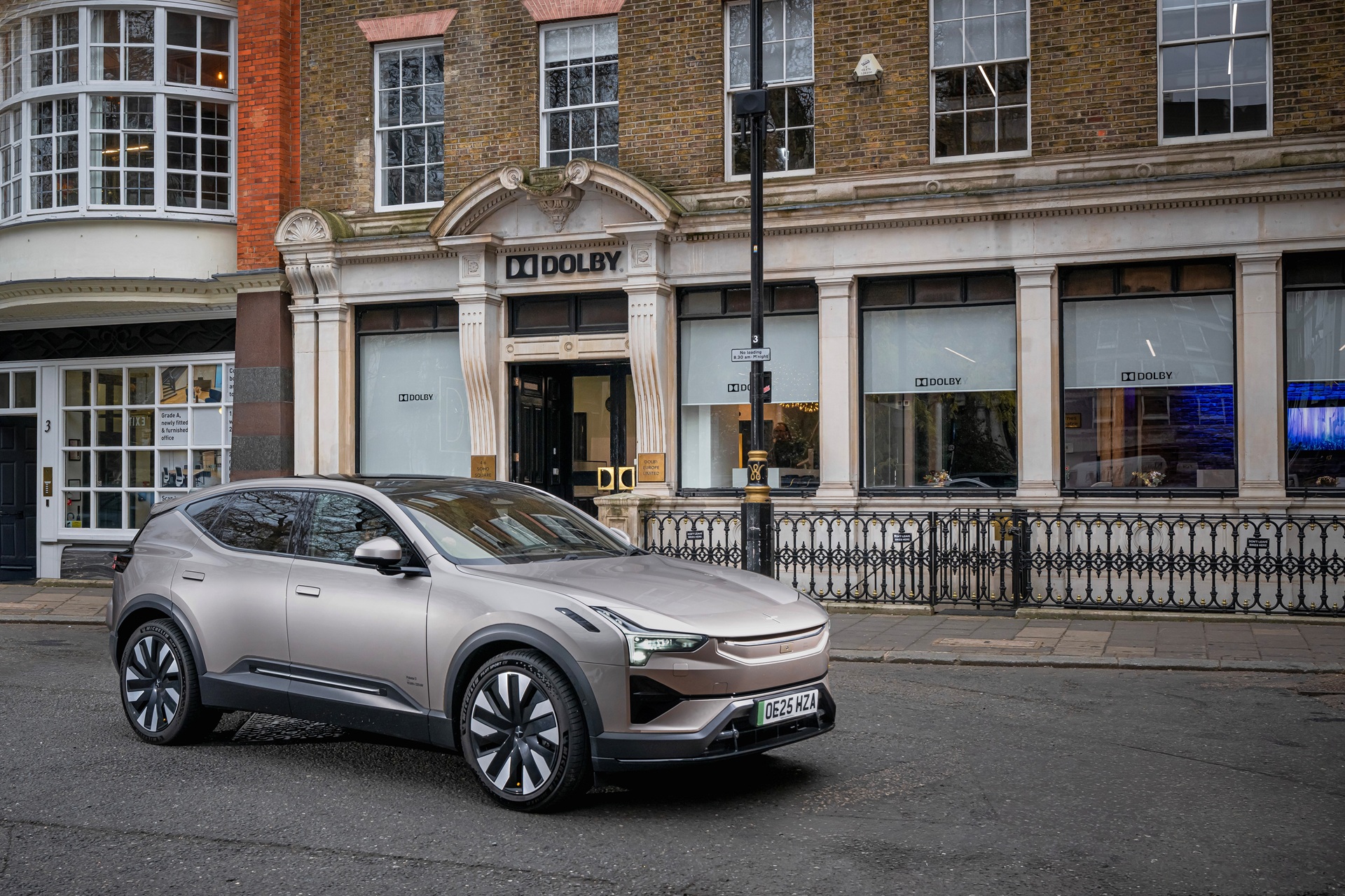A person enjoying music with a high-quality sound system in a modern car, highlighting the ultimate in-car audio experience.